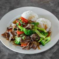 Mongolian Beef  · Marinated slice beef, bell pepper, onion, green onion. 