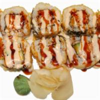 Tempura Philly Roll  · Deep fried philly roll topped with spicy mayo and sushi sauce.