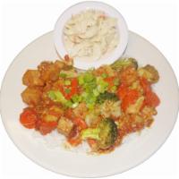 Tofu Cube Stir Fry  · Stir-fried with fried tofu, garlic sauce, spicy lemongrass sauce, carrot and onion and green...