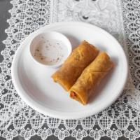 Veggie Lumpia  · Crispy fried egg rolls with minced tofu, carrots, sweet potatoes, sweet peas, bean sprouts (...
