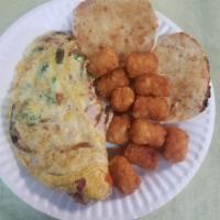 Combo Omelet · Beaten eggs that are folded over a filling. 