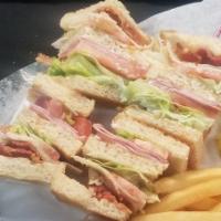 Club Sandwich  · Three layers of Toasted White or Wheat Bread with Ham, Turkey and Bacon Topped with Lettuce,...