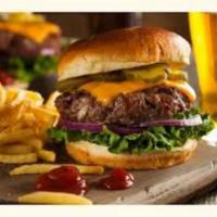 Cheeseburger · 1/3-pound Hamburger Patty with Lettuce, Red Onion and Tomatoes served on a Sesame Seed Bun w...