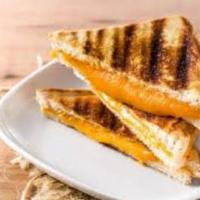 Grilled Cheese Sandwich · Grilled White or Wheat Bread with Melted American Cheese.