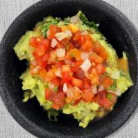 GUACAMOLE · made with 3 fresh hass avocados, onions, cilantro, lime juice, mixed in the molcajete (serve...