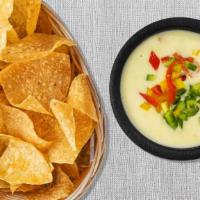 CHIPS & QUESO · housemade tortilla chips with queso and pico de gallo