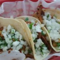 Pollo Taco · Jacalitos seasoned grilled chicken. Order of 3 tacos with onion and cilantro on the top.