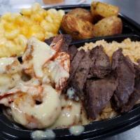 Two Steaks and Shrimps · Seared Steaks and Shrimps with Garlic Butter sauce include Spanish rice