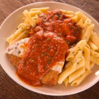 Chicken Parmesan Pasta · Breaded boneless breast of chicken with baked mozzarella cheese and marinara. Sauce served o...