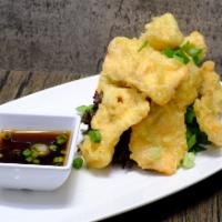Salmon Tempura Bites · Salmon lightly fried and served with our ginger ponzu sauce.