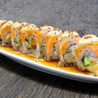 Golden Gate Roll · Shrimp tempura, crab mix, cucumber, avocado topped with salmon, lemon slice, eel sauce and s...