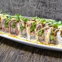 A1 Roll · House crab mix, cucumber, avocado, asparagus, topped with steak, sprouts and spicy mayo sauce.