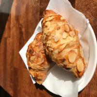 Almond Croissant  · A flaky French pastry.