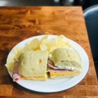 Kleins Club - Ciabatta breakfast Sandwich  ·  Ciabatta Bread filling with Smoked Ham, American cheese, egg and our homemade Chive cheese ...