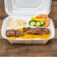 Beef Tikka & 1 Skewer · Beef Tikka Rice, hummus and salad.