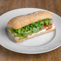 Prosciutto Sandwich · Fresh mozzarella, olive oil, arugula and prosciutto.
