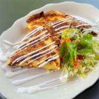 Cheese Quesadilla · Giant flour tortilla grilled with choice of meat and melted cheese. Served with lettuce, tom...