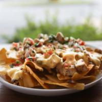 Chicken Nachos · Add jalapeno for an additional charge.