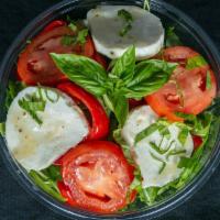 Capri Salad Bowl · arugula, fresh mozzarella, plum tomato, roasted red pepper, 
basil, balsamic vinaigrette