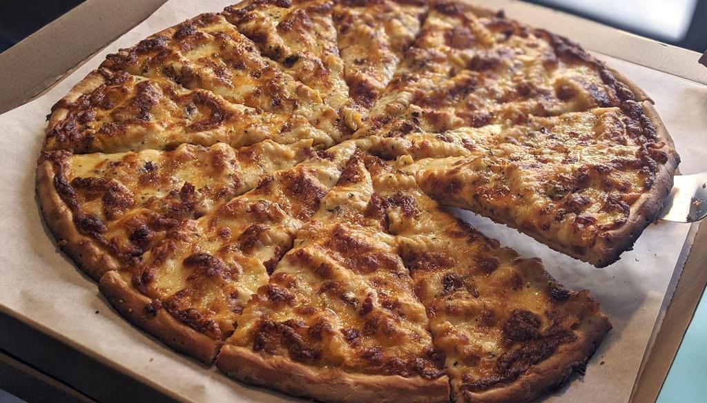 Mac and Cheese Pizza · Cheddar cheese sauce, mozzarella cheese, mac and cheese, bacon, and cheddar cheese.