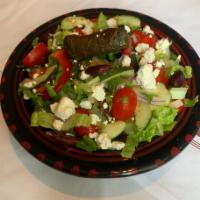 Mediterranean Salad · Vegan, gluten free. Romaine heart, olives, cucumbers, tomatoes, grape leaves, lemon-olive oi...