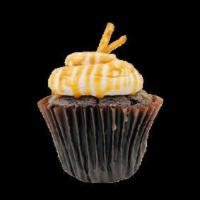 Caramel Crunch Cake  · Chocolate cake topped with a salted caramel buttercream, topped with caramel and pretzels.