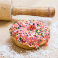 D4. Pink Sprinkle Donut · Pink sprinkle ring-shaped fried cake.