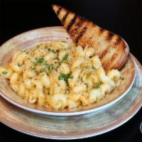3 Cheese Mac and Cheese · Merkts Cheddar, White American and Colby cheese topped with toasted bread crumbs. Add protei...