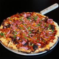 The Red Barn BBQ Pizza · Big tasty BBQ sauce, pulled pork, pickled red onions, cheese blend.