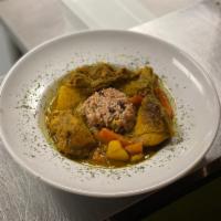 Curry Chicken Lunch · Jamaican staple, savory curry chicken with potatoes and carrots Served with rice and peas or...