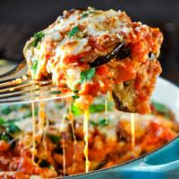 Parmigiana · Eggplant parmigiana served with homemade fettuccine in tomato sauce 