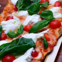 Bufala Pizza  · Tomato sauce, light mozzarella, fresh bufala mozzarella, basil