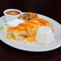 Burrito de Pollo Plate · Filled with chicken and covered in cheese, served with salad, rice, and beans.