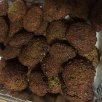 Falafel · Istanbul spiced vegetable patties of fava beans, parsley and onion.