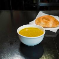 Lentil Soup · Our homemade red lentil soup with pureed vegetables, butter, spices and lemon juice.
