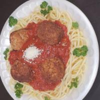 Spaghetti Meatballs · Meatballs, spaghetti, marinara sauce and Parmesan cheese over pasta.