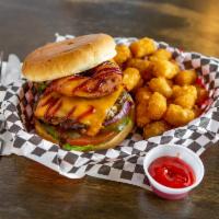 The Roadster · 1/2 pound patty topped with cheddar cheese, an onion ring. Bbq sauce on a garden of lettuce,...