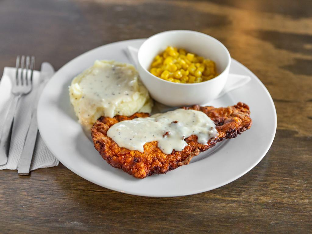 Chicken Fried Chicken · Topped with gravy, served with mashed potatoes and corn.