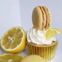 Lemon Cupcakes · Lemon cupcakes, cream cheese frosting, topped with a macaroon - 6 cupcakes included