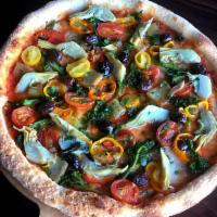Pizza Ortolana · Eggplant, olives, capers, Fresno chili, San Marzano tomato sauce.
