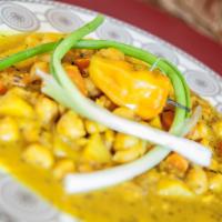 Coconut Curry Chickpeas Platter Dinner · Chickpeas and garbanzo beans, potatoes, carrots, slow-cooked in coconut curry sauce served w...