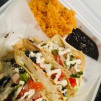 Taco Plate · 2 Tacos of Choice, served with lettuce, pico de gallo and cheese. Served with Rice and Beans...