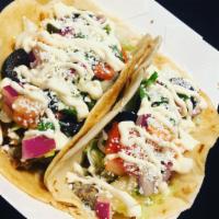 Tacos  · Taco with choice of Meat, Lettuce, Pico De Gallo and Cheese. 