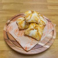 Potato Puff · Four baked pastries filled with spiced potato. 
