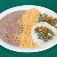 1. Pork Carnitas Combo Plate · Served with choice of side.