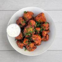 custom cauliflower wings (served with ranch - vegan) · Pick any sauce and we'll toss it in our crispy gluten-free cauliflower wings. Served with ra...