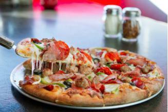 2. Phosgo Supreme Pizza · New word worthy. Pepperoni, ham, black olives, Italian sausage, green pepper and onions with mozzarella over red sauce. 