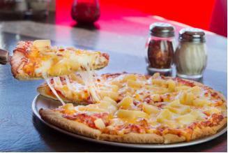 5. Samoan Pizza · Fan favorite. One-upping the Hawaiian. Canadian bacon and pineapple with provolone, smoked Gouda and sharp cheddar over red sauce.