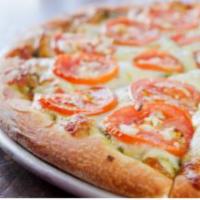 13. Sam I Am Pizza · Eat anywhere. Sliced tomatoes and fresh garlic with mozzarella and provolone over pesto sauc...