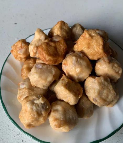 Vegan Taro Ball · 600 g. Keep frozen -18C. Ingredients: textured soybean protein, water, taro, starch, soybean oil, salt, sugar, vegetarian spice. Cook method: pan-fry, steam, oven, deep fry, microwave. More nature with taro can put in soup, can fry with vegetable, can BBQ, hot pot, but before little pan fry then do whatever you like.